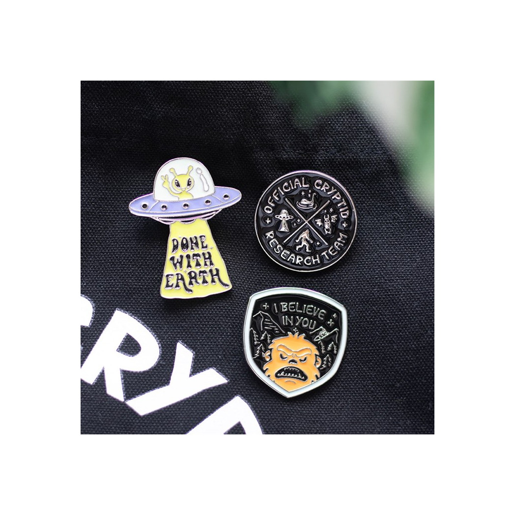 Camp Cryptid: Glow in the Dark UFO Pin Badge